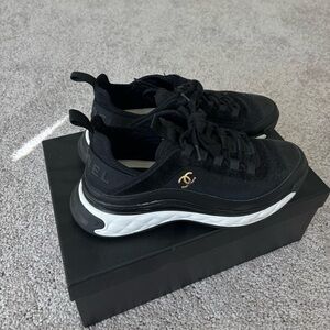 CHANEL Black and Gold Women's Sneakers